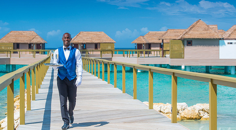 overwater villas at sandals butler service luxury hotel