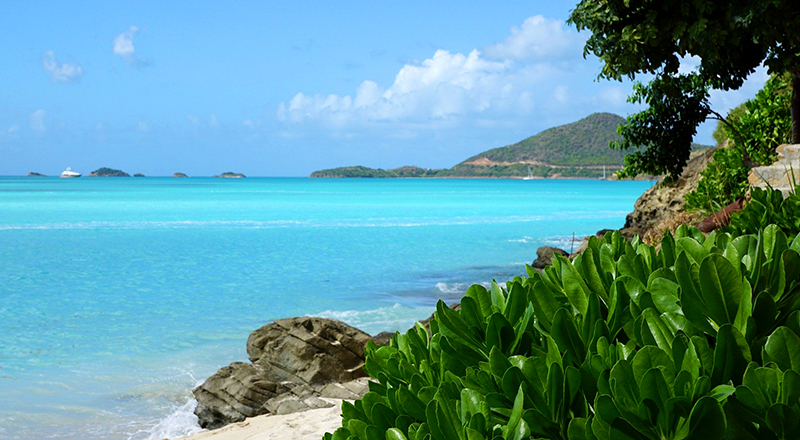 safest caribbean islands antigua and barbuda beach tourism
